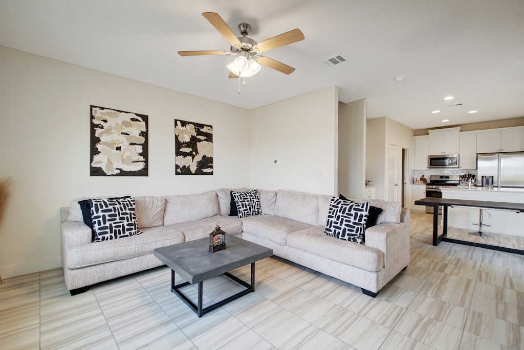 413 White Steppe Way Georgetown, TX 78626 - Photo 6 of 25 a living room with furniture and white walls