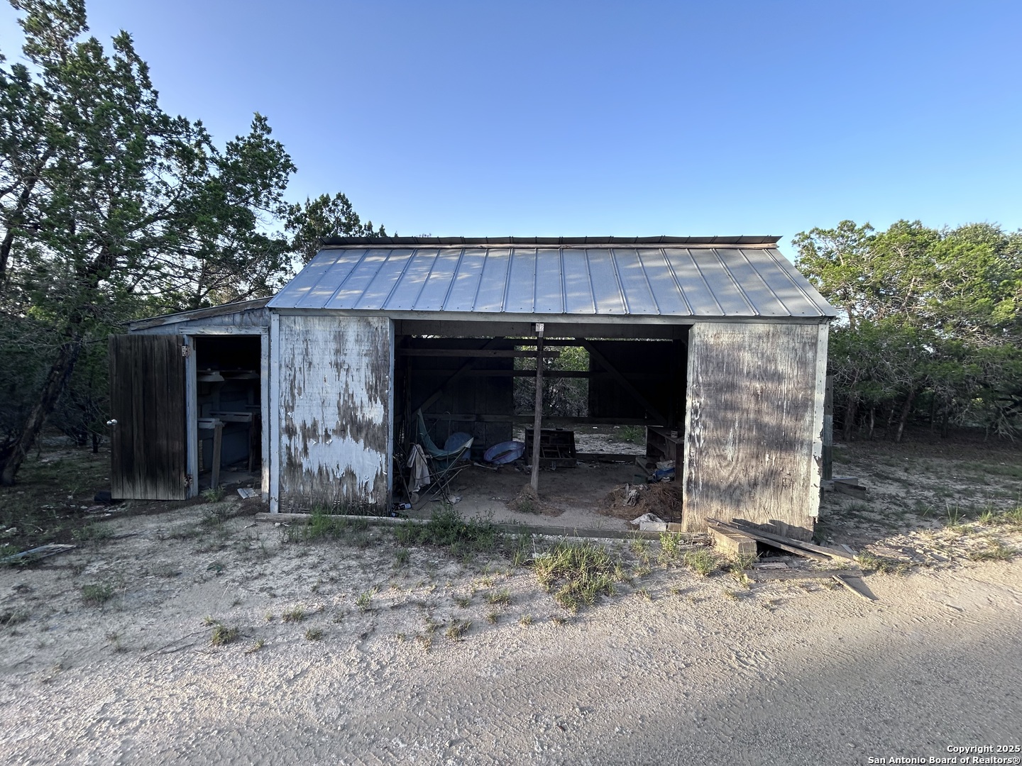 320 Frontier Lane Bandera, TX 78003 - Photo 2 of 11 a view of a backyard