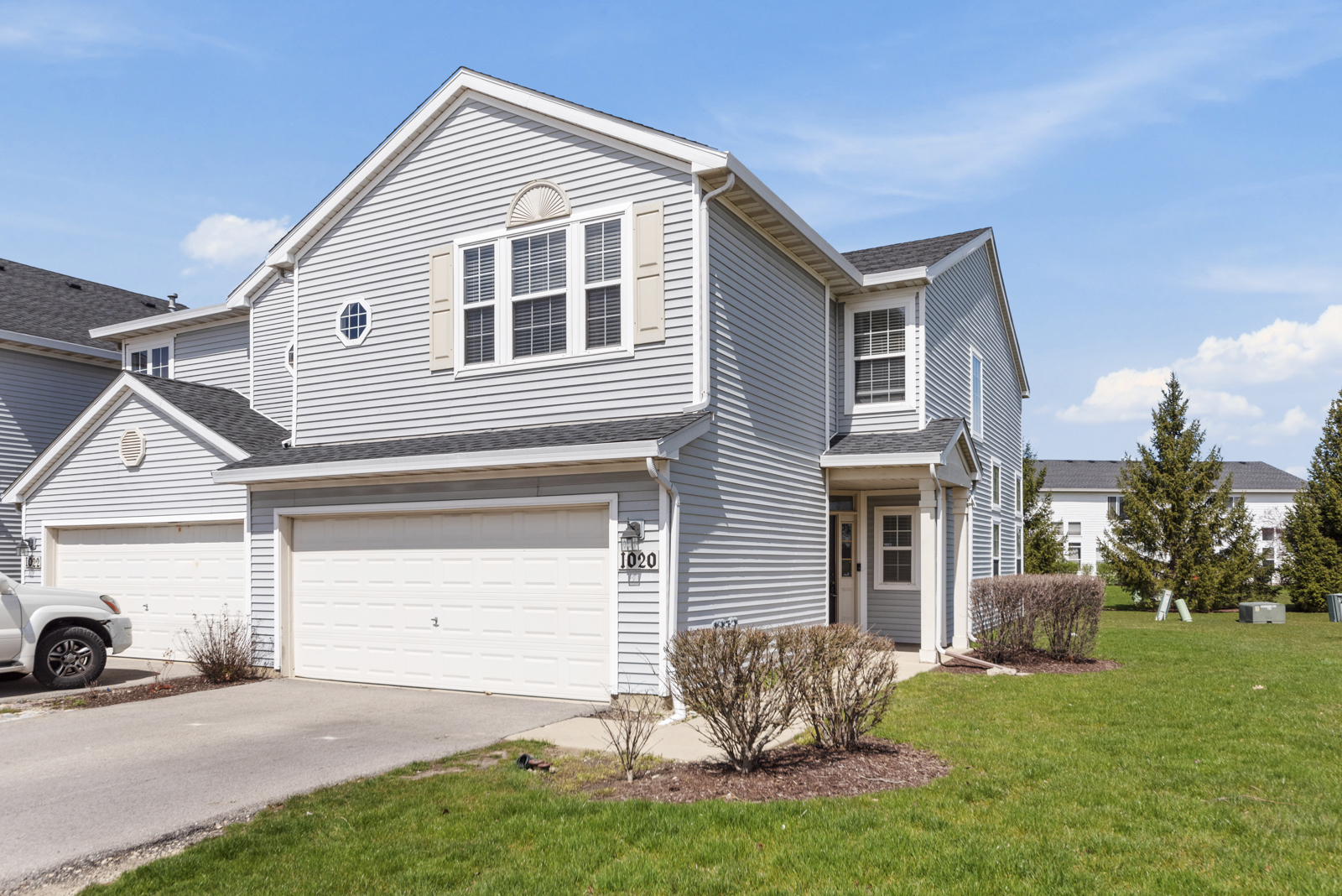 1020 Key Largo Drive Romeoville, IL 60446 - Photo 1 of 22 a backyard of a house with table and chairs