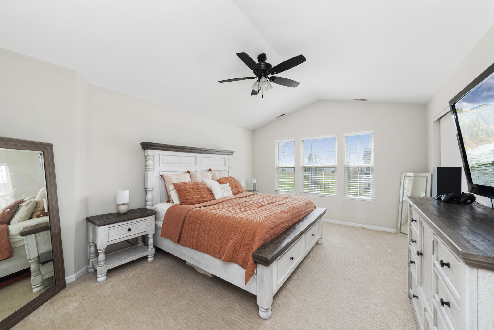 1020 Key Largo Drive Romeoville, IL 60446 - Photo 12 of 22 a bedroom with a bed and a flat tv screen on dresser