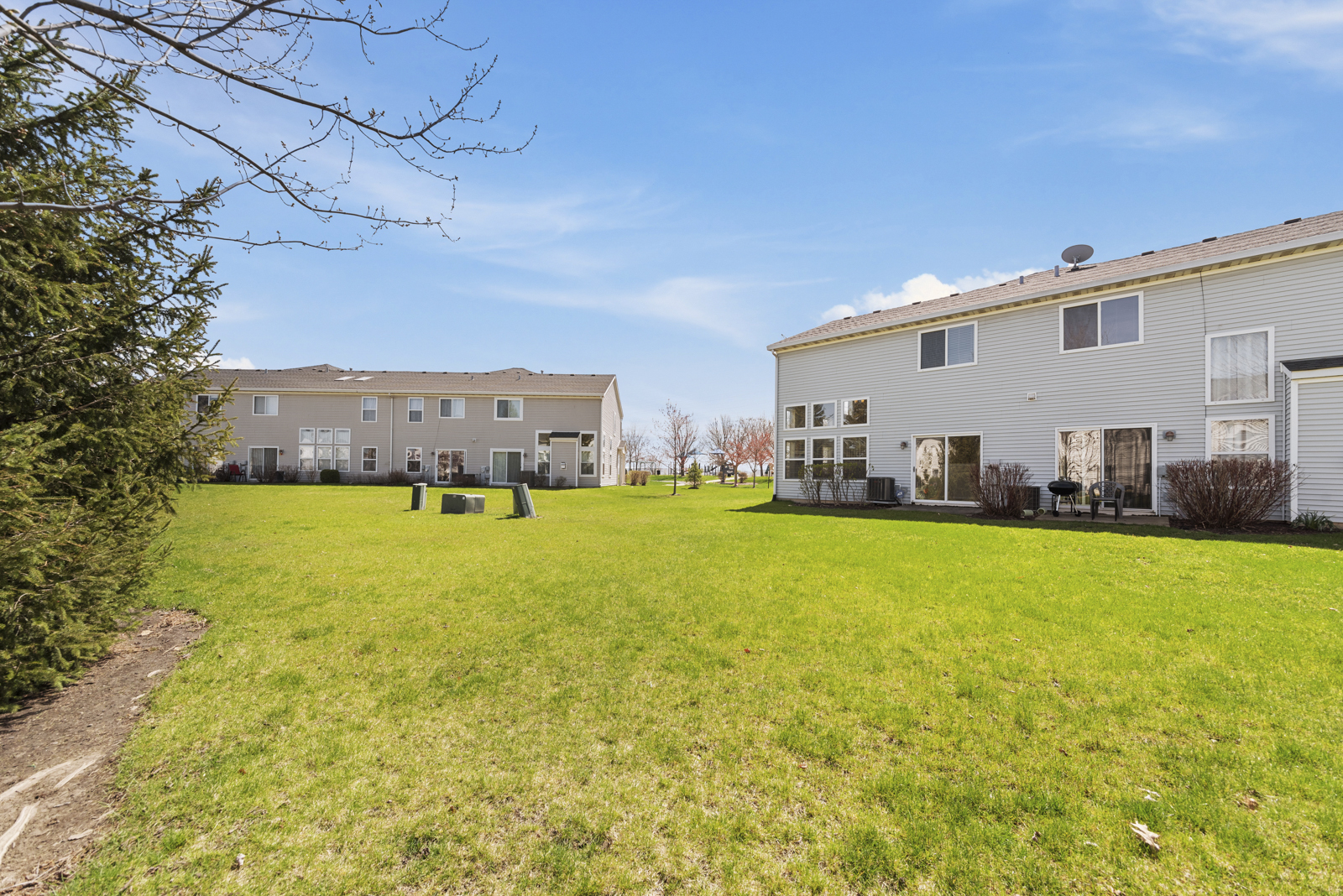 1020 Key Largo Drive Romeoville, IL 60446 - Photo 21 of 22 a view of a house with a big yard