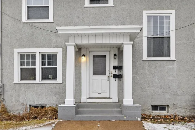 a view of a building and a yard
