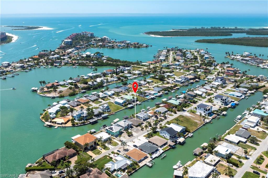 164 Trinidad Street Naples, FL 34113 - Photo 2 of 43 a view of a city and ocean view