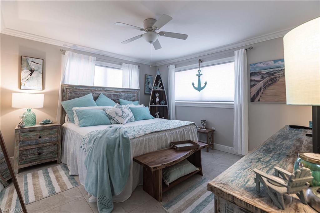 164 Trinidad Street Naples, FL 34113 - Photo 32 of 43 a bed room with a bed and a window