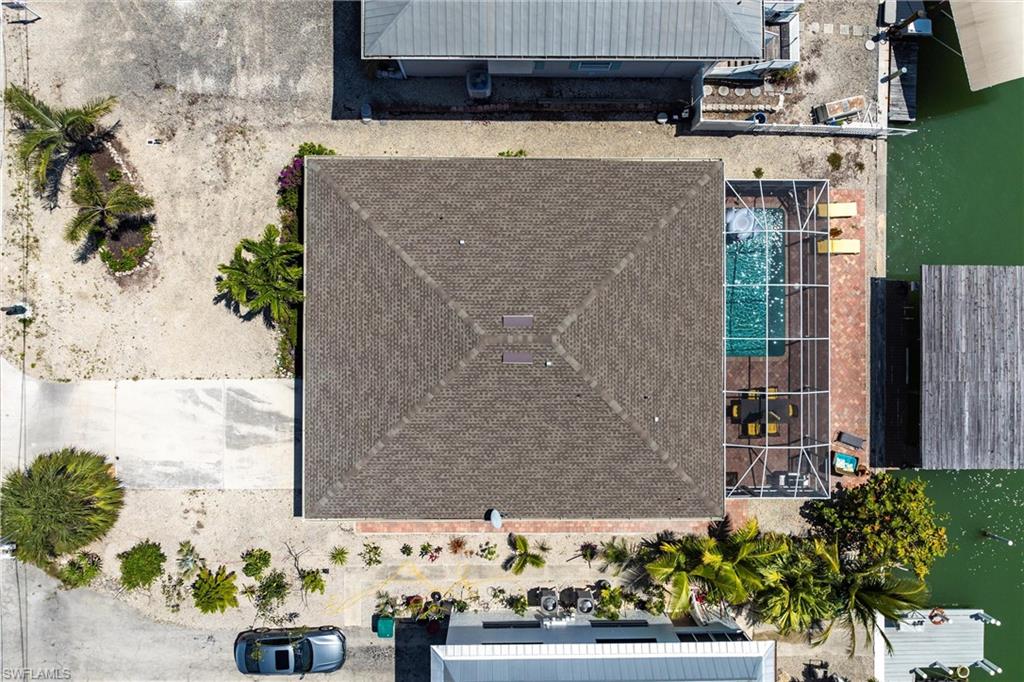 164 Trinidad Street Naples, FL 34113 - Photo 7 of 43 a view of bathroom with a potted plant