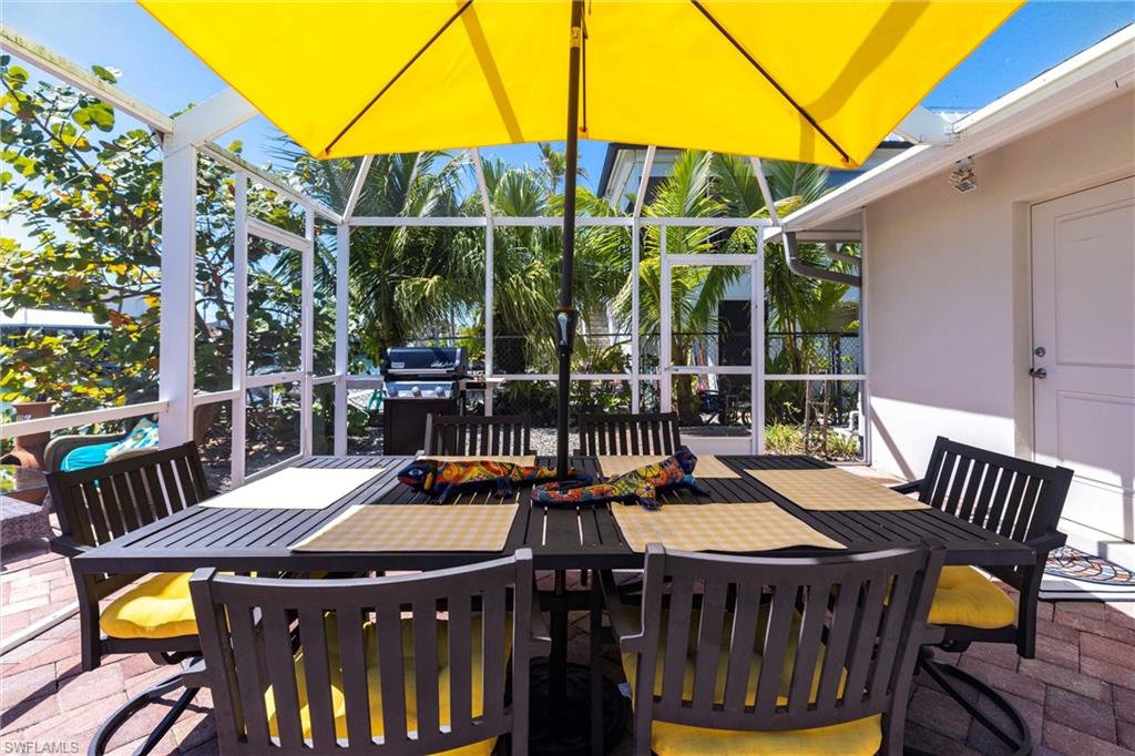 164 Trinidad Street Naples, FL 34113 - Photo 10 of 43 a view of a patio with iron fence