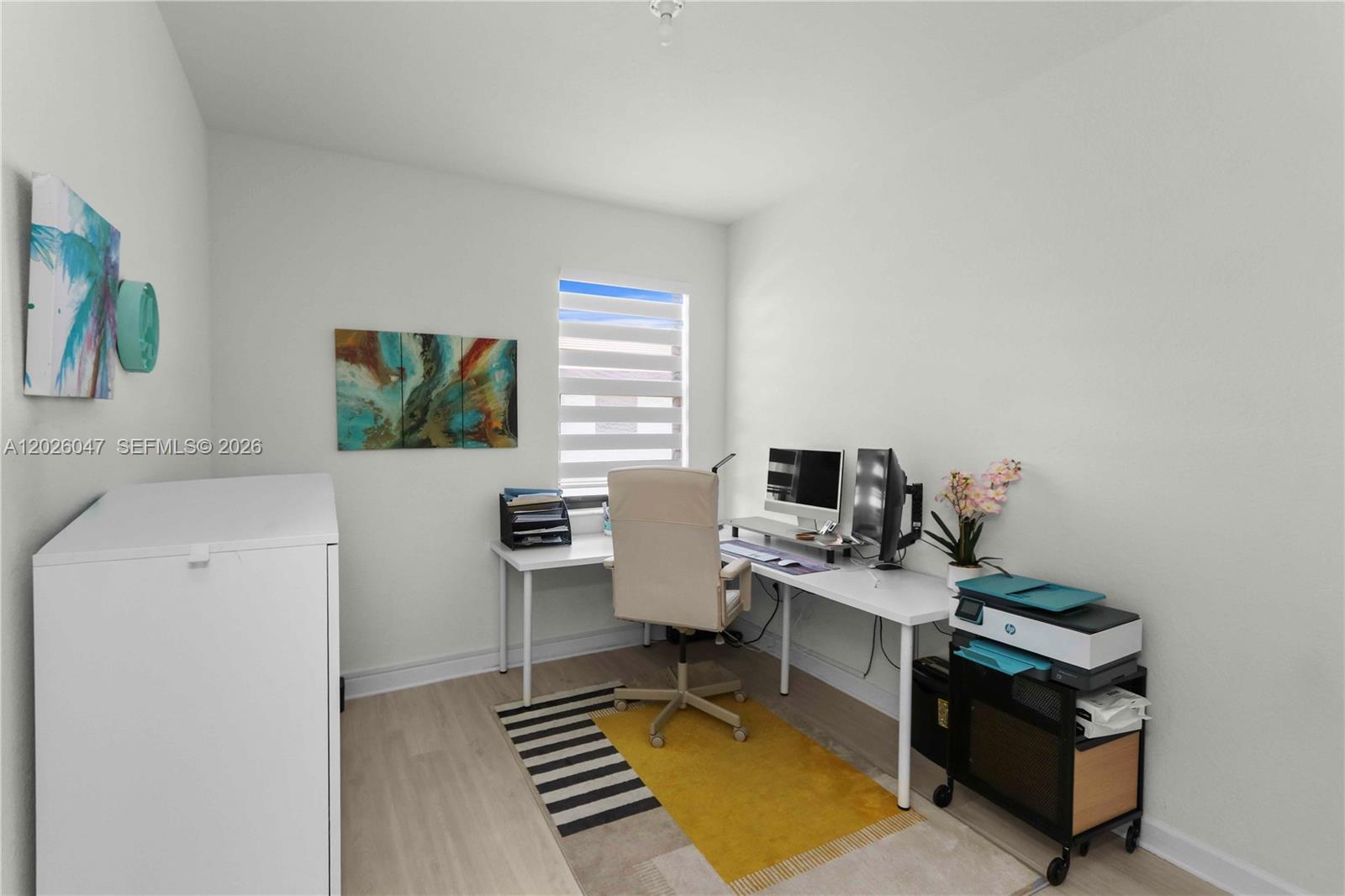 12862 Southwest 231st Street Miami, FL 33170 - Photo 18 of 30 a workspace with furniture and window