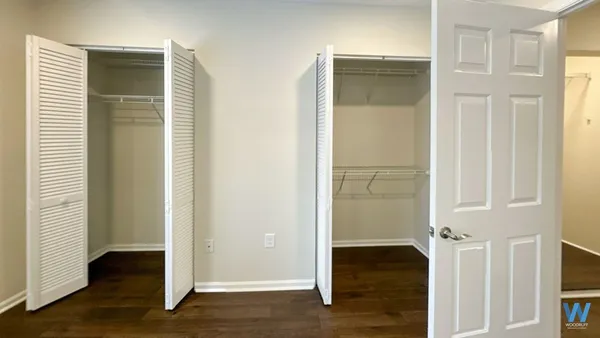 a view of a bathroom with wooden floor