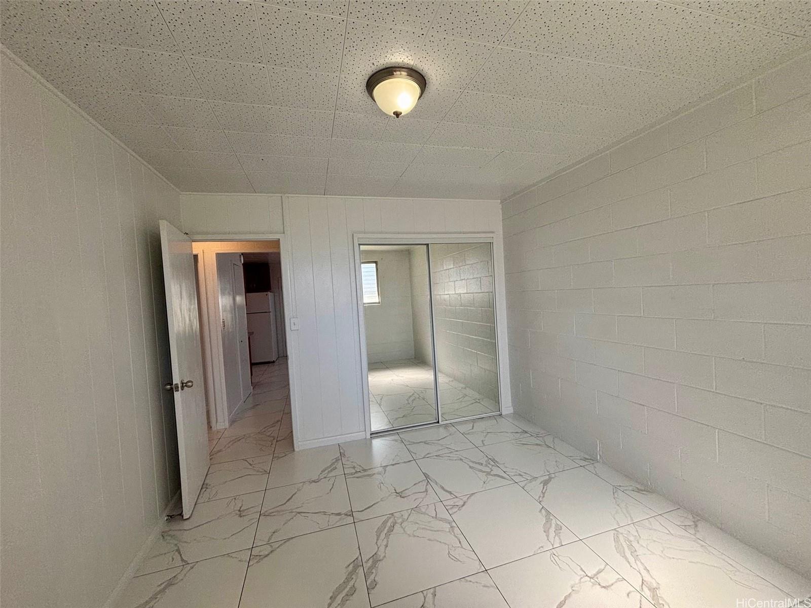 608 Judd Street, Unit A Honolulu, HI 96817 - Photo 11 of 13 a view of an empty room and window