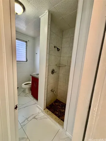 a view of a hallway to a room