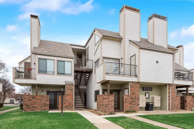 a view of a big building with many windows