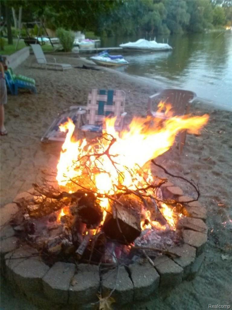 913 Woodruff Lake Road Highland, MI 48357 - Photo 6 of 31 6 Beach.JPG
