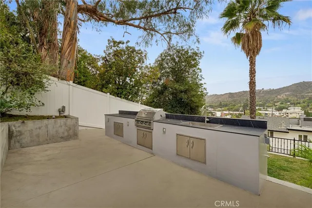 a view of a terrace with a garden