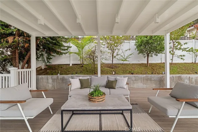 a outdoor living space with furniture and garden view