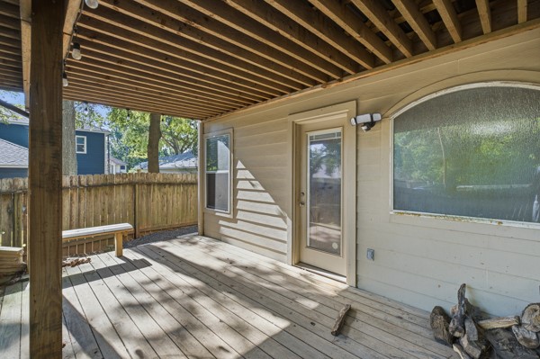 13396 Teel Road Montgomery, TX 77356 - Photo 38 of 50 a view of a balcony with chair and wooden floor