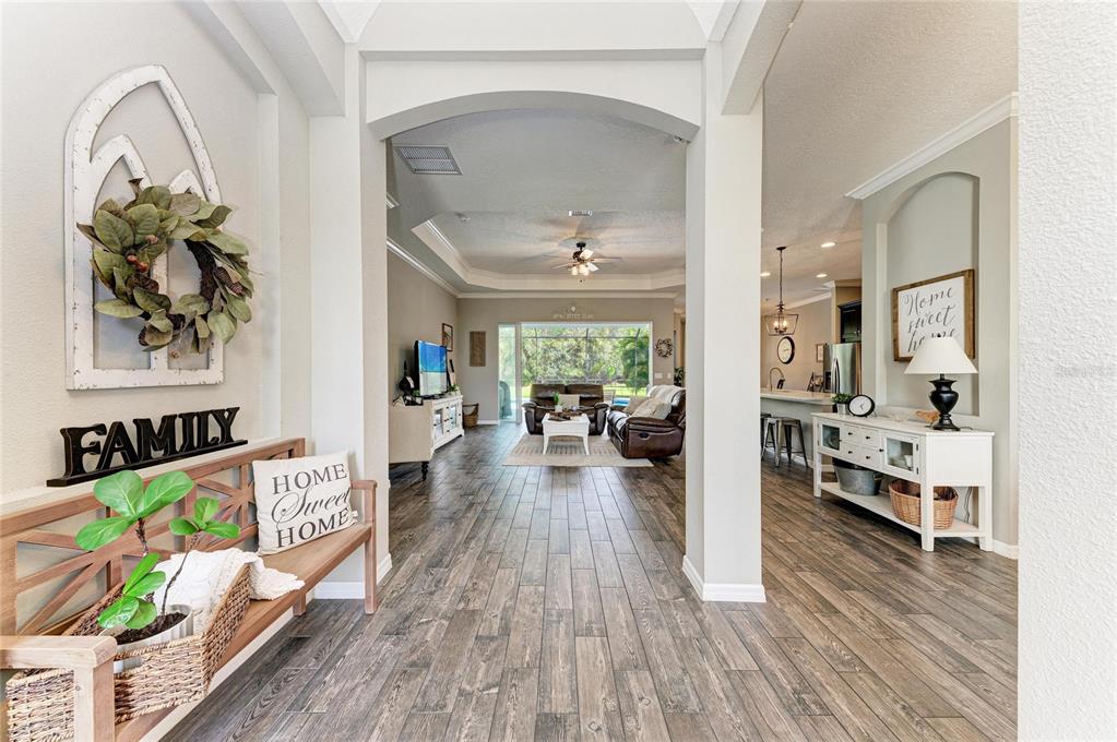 16336 26th Street East Parrish, FL 34219 - Photo 13 of 69 a living room with furniture and a wooden floor