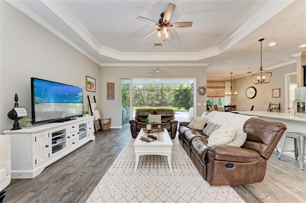 16336 26th Street East Parrish, FL 34219 - Photo 15 of 69 a living room with furniture and a flat screen tv