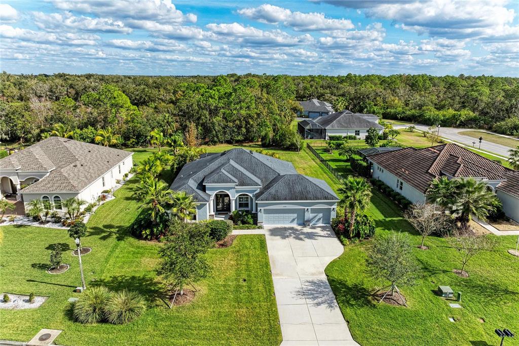 16336 26th Street East Parrish, FL 34219 - Photo 2 of 69 a aerial view of a house with a garden