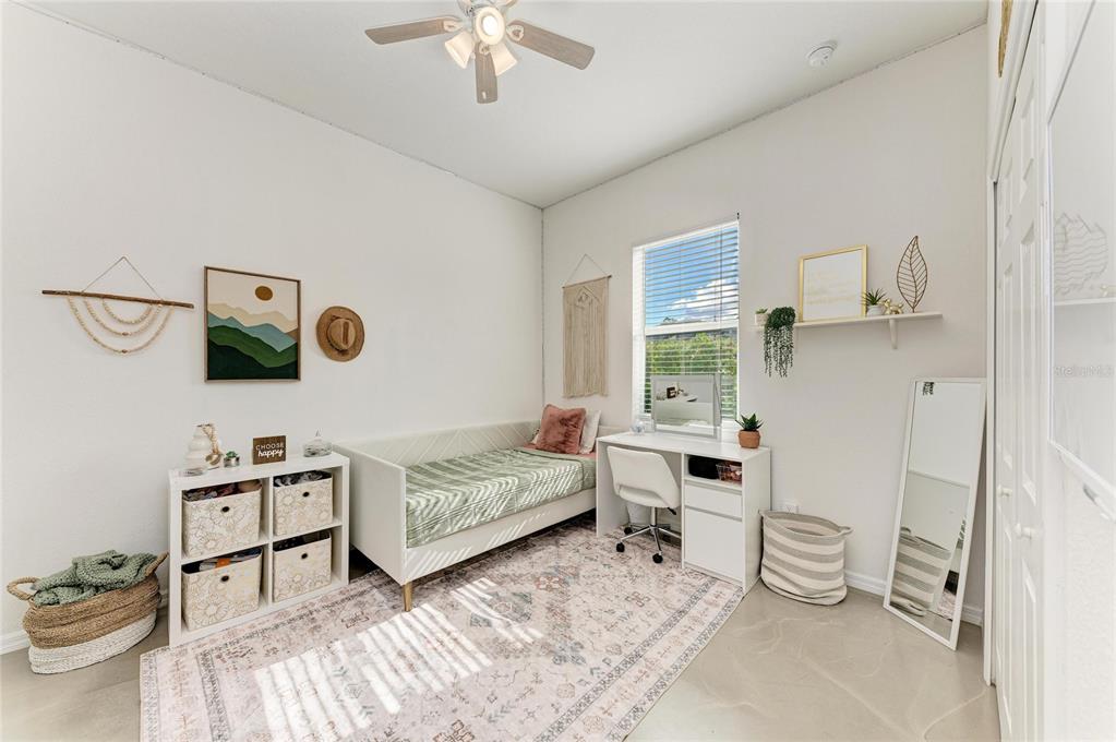 16336 26th Street East Parrish, FL 34219 - Photo 42 of 69 a living room with furniture and a table