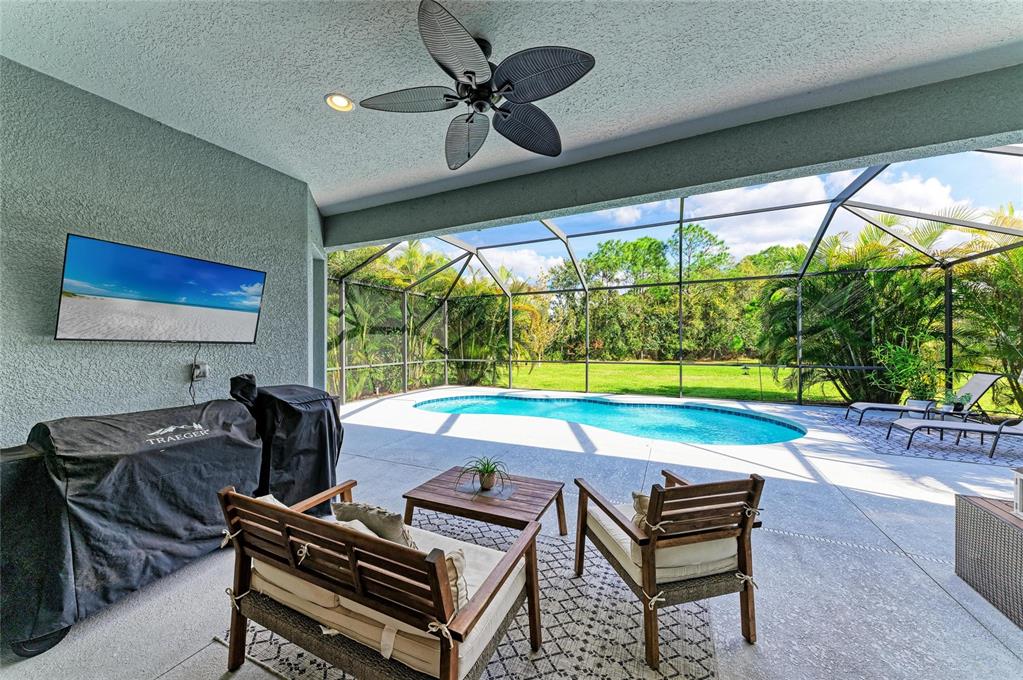 16336 26th Street East Parrish, FL 34219 - Photo 50 of 69 a room with furniture and a flat screen tv