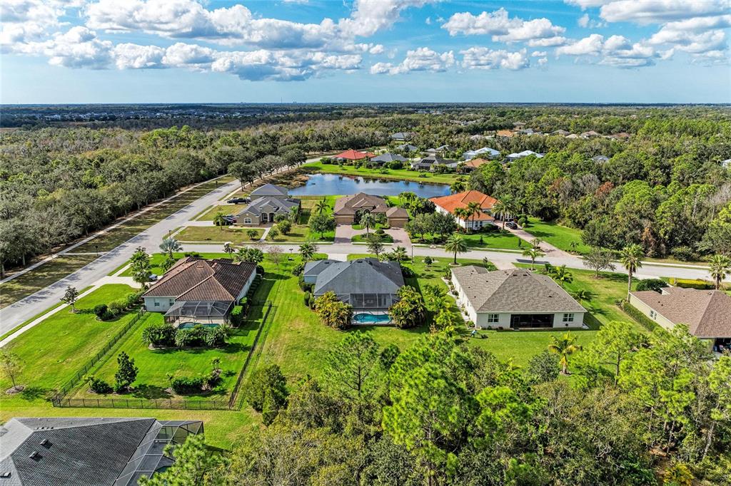 16336 26th Street East Parrish, FL 34219 - Photo 5 of 69 an aerial view of residential houses with outdoor space and ocean view