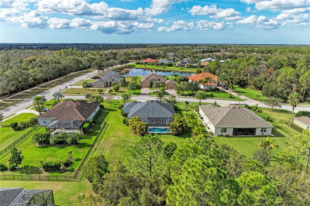 16336 26th Street East Parrish, FL 34219 - Photo 59 of 69 an aerial view of residential houses with outdoor space