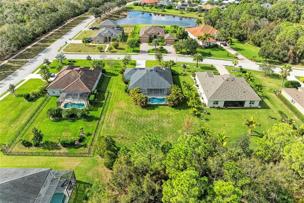 16336 26th Street East Parrish, FL 34219 - Photo 60 of 69 an aerial view of residential houses with outdoor space and street view