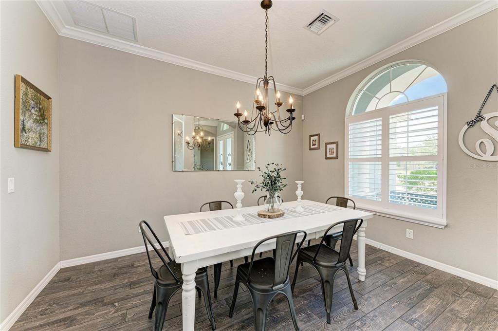 16336 26th Street East Parrish, FL 34219 - Photo 10 of 69 a view of a dining room with furniture window and outside view