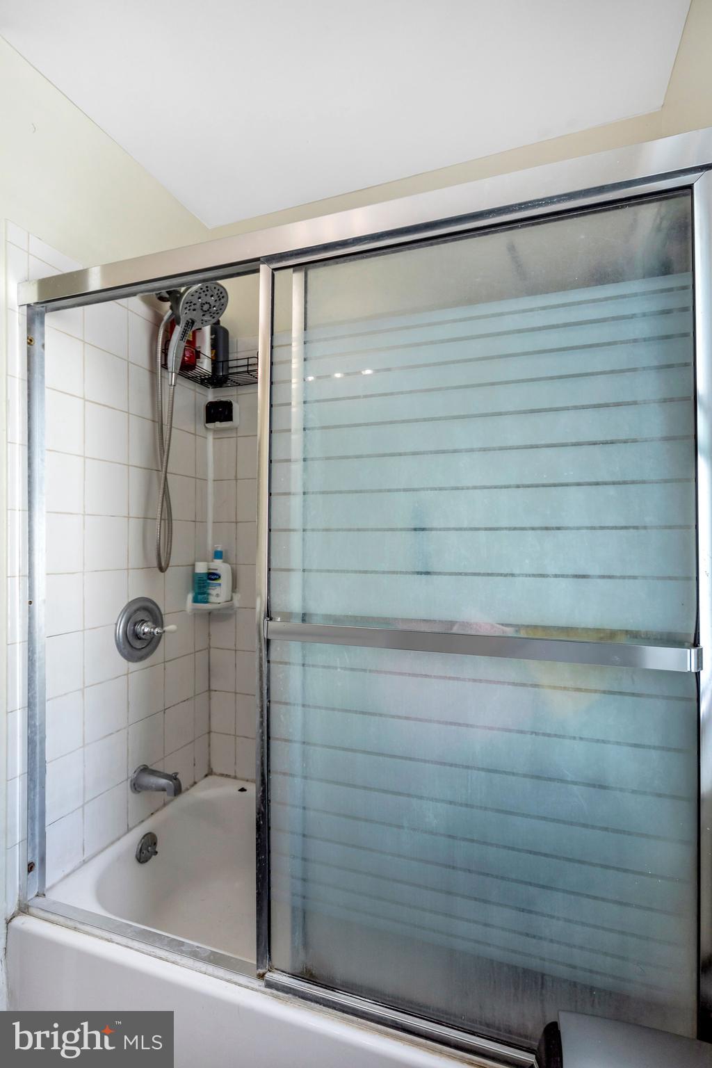 117 Overhill Road Upper Darby, PA 19082 - Photo 23 of 33 a bathroom with a shower and a bathtub