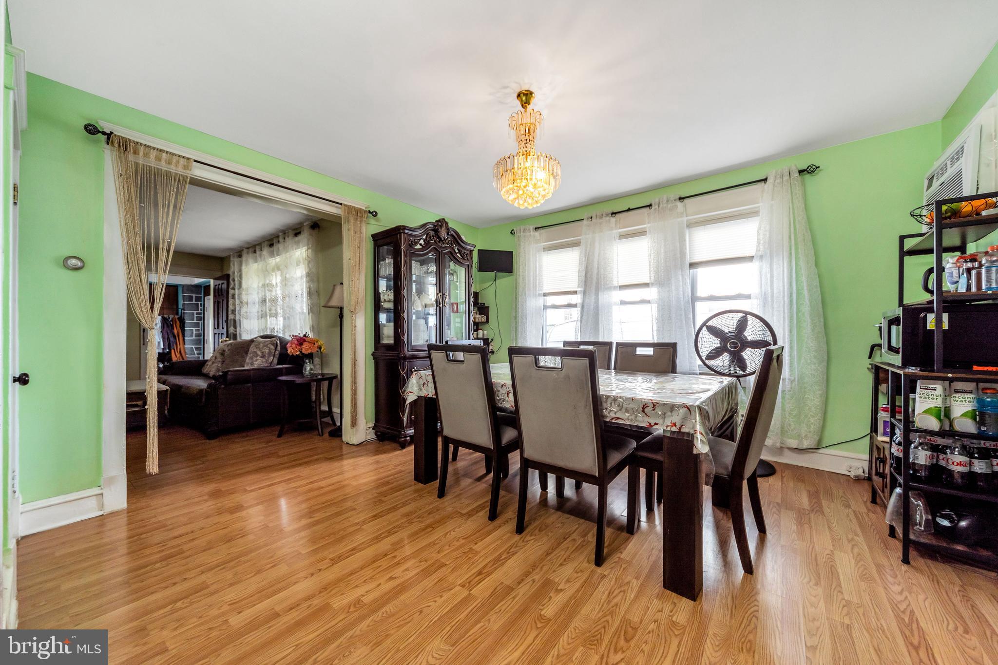 117 Overhill Road Upper Darby, PA 19082 - Photo 8 of 33 a view of a dining room with furniture and wooden floor