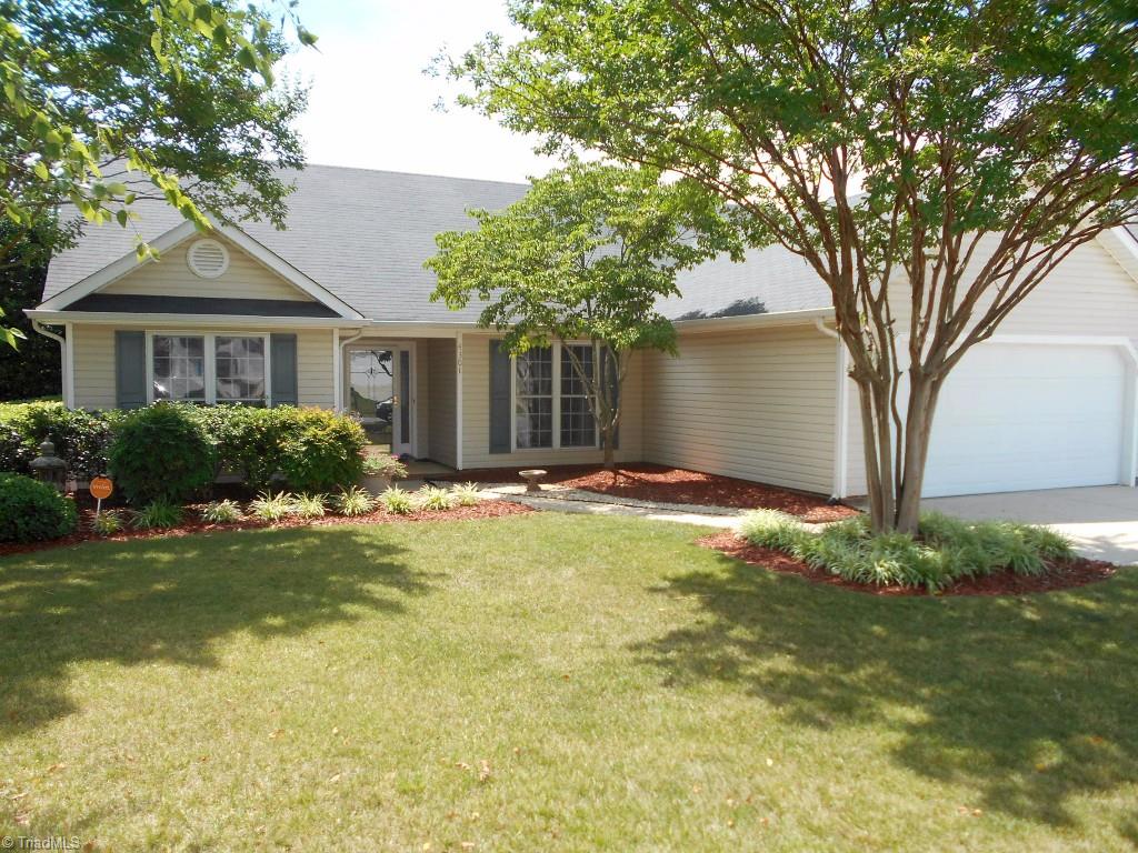 4301 Shade Tree Court High Point, NC 27265 - Photo 1 of 23 Front of home. Easy maintenance with vinyl siding and a concrete drive and walk way.