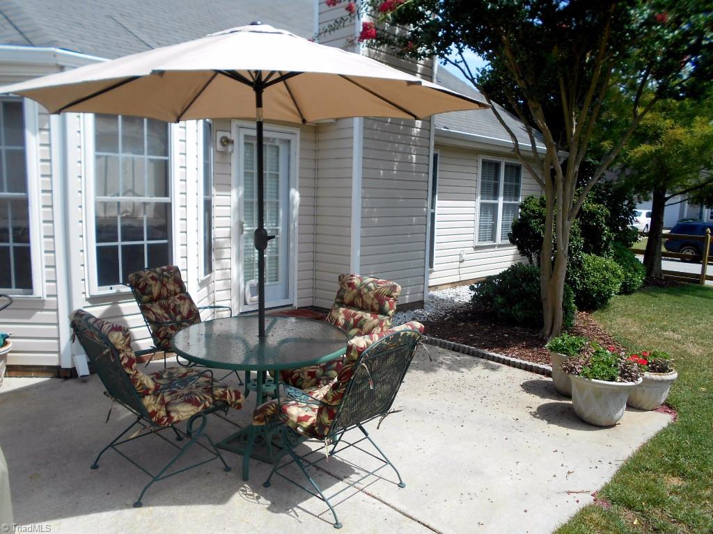 4301 Shade Tree Court High Point, NC 27265 - Photo 23 of 23 Just off the back of the home has a patio perfect for cooking out and/or relaxing