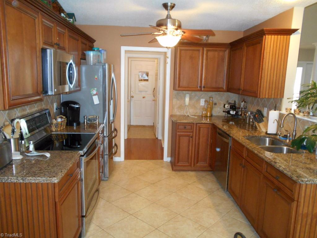 4301 Shade Tree Court High Point, NC 27265 - Photo 10 of 23 This photo shows the entry to the garage through the laundry