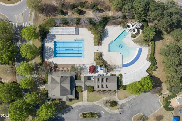 an aerial view of a house with outdoor space