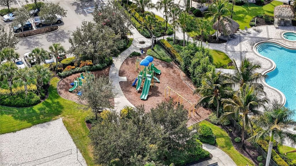 2126 Hamlin Street Naples, FL 34120 - Photo 30 of 34 an aerial view of a house with a yard and garden