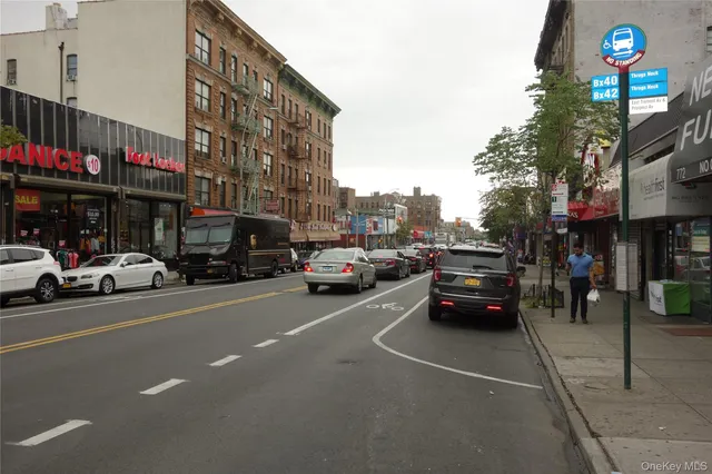 a view of a street with cars