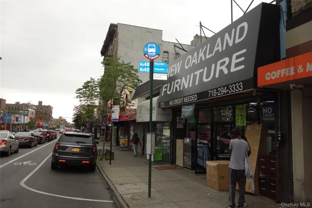 a view of a street with cars