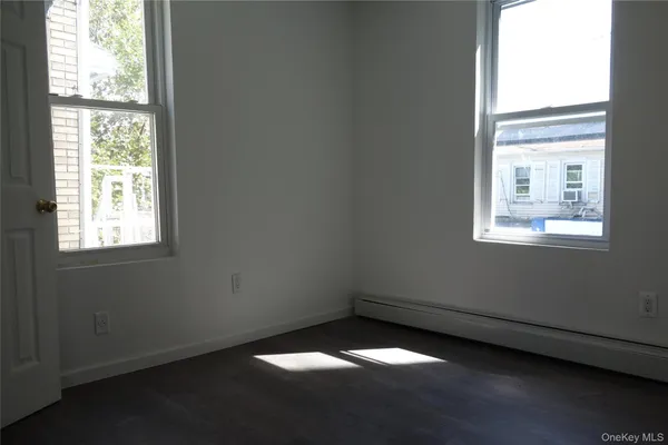 a view of an empty room and window