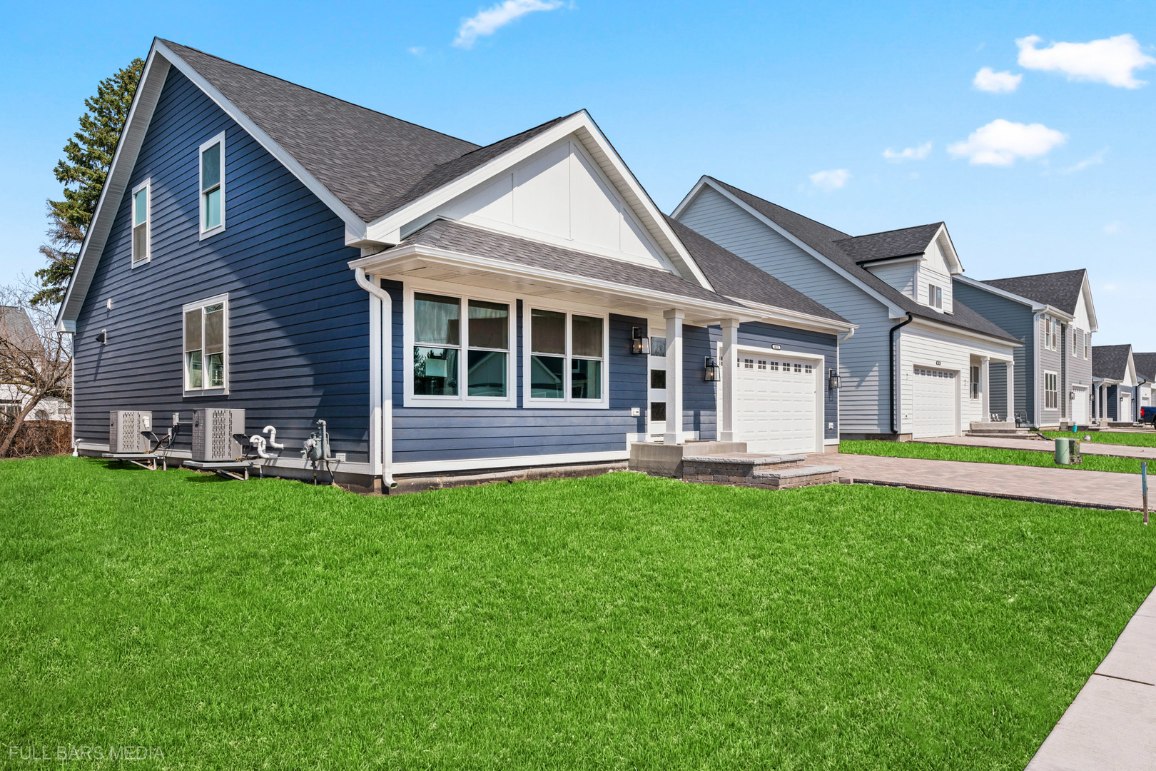 4020 Faith Lane St. Charles, IL 60174 - Photo 2 of 37 a front view of a house with a garden