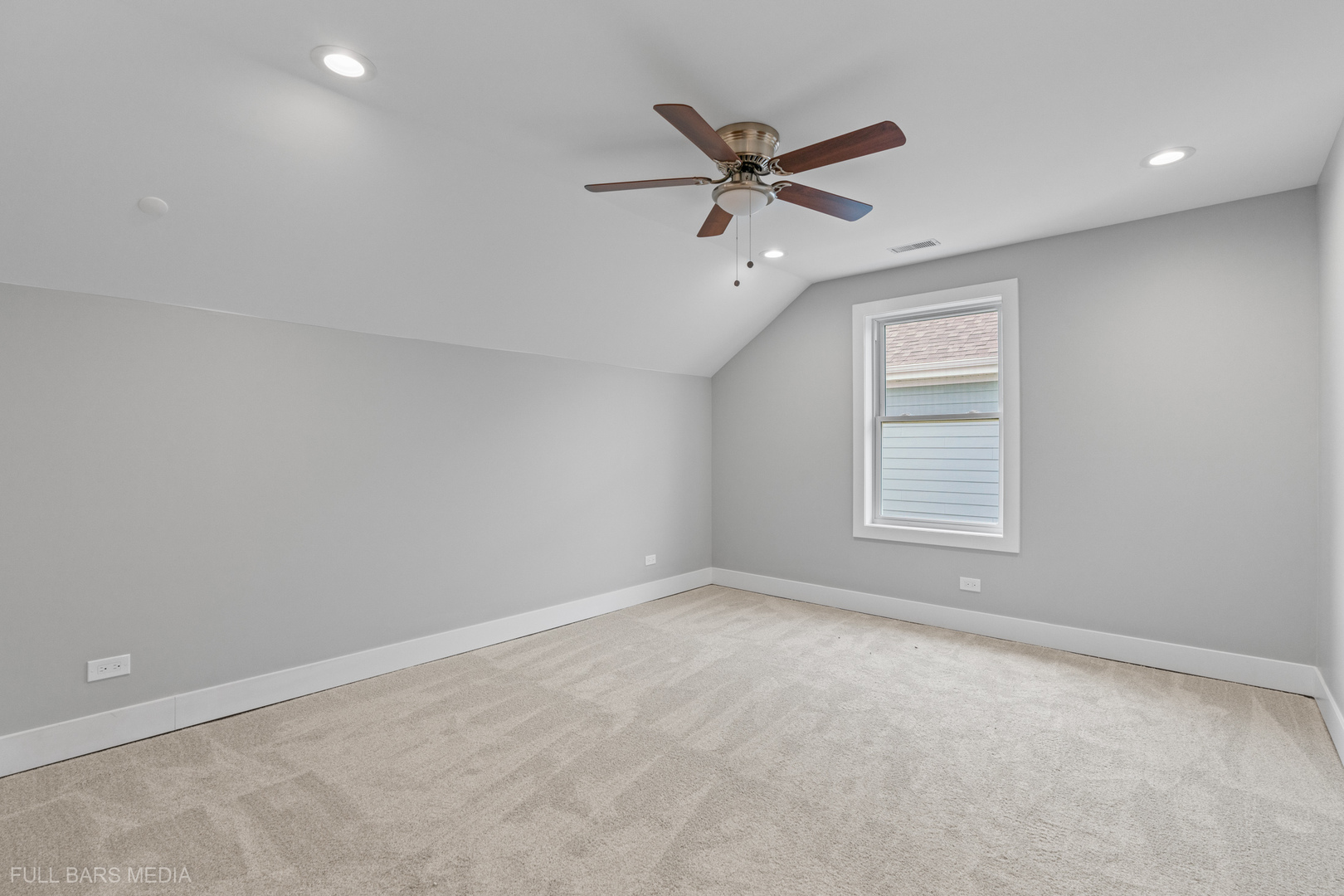 4020 Faith Lane St. Charles, IL 60174 - Photo 32 of 37 an empty room with a window and a fan