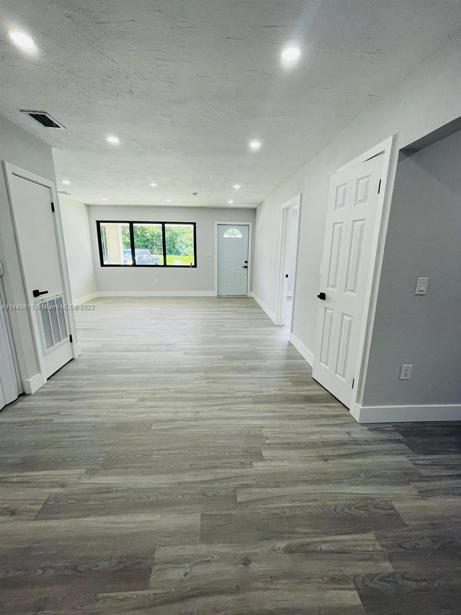 2521 Northwest 121st Street Miami, FL 33167 - Photo 6 of 43 a view of an empty room