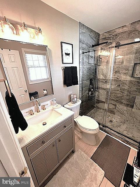 340 A 12th Street Colonial Beach, VA 22443 - Photo 23 of 29 a bathroom with a sink toilet and shower