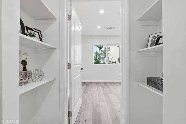 a view of entryway with wooden floor