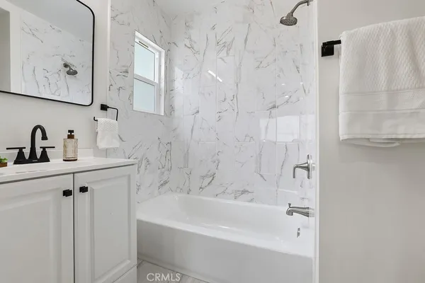 a bathroom with a bathtub