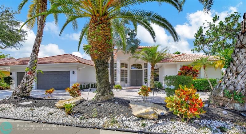 WELCOME TO PALM ISLAND, A PRESTIGIOUS BOUTQUE ENCLAVE OF CUSTOM HOMES IN THE HEART OF WESTON! NEWLY REMODELED WITH A CONTEMPORARY FLAIR, THIS 5+DEN, 4.5BA, 3CG LAKEFRONT HOME W/POOL/SPA SHOWS LIKE A MODEL!