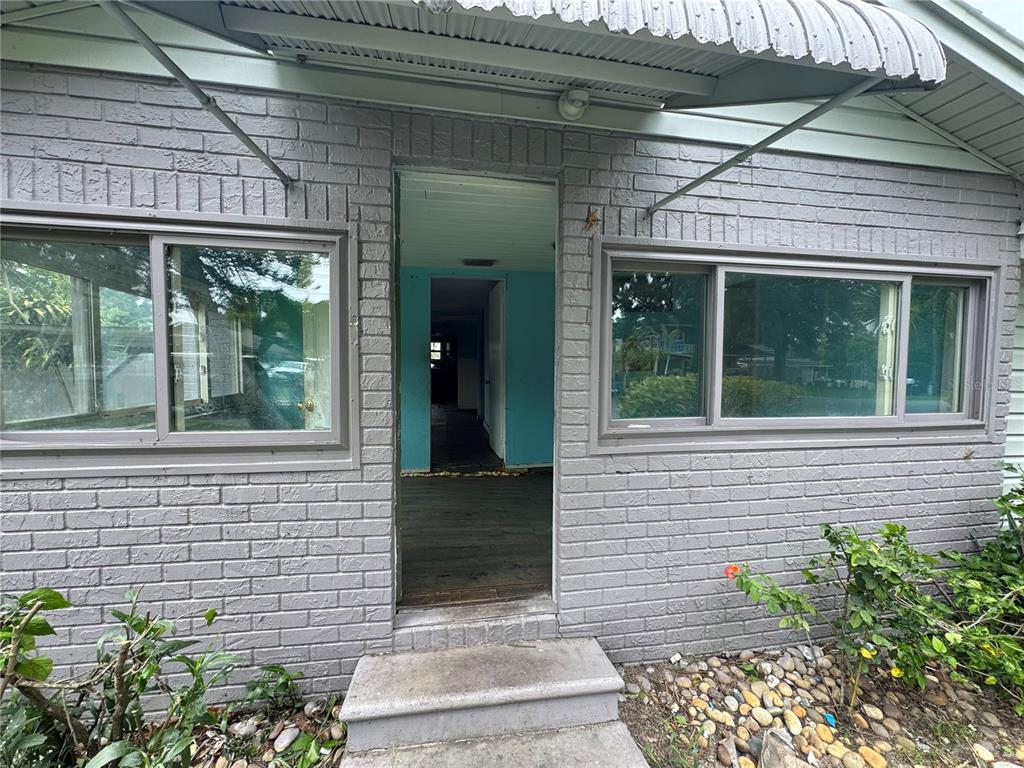 269 12th Avenue Ocoee, FL 34761 - Photo 1 of 1 a view of house with a window and wooden floor