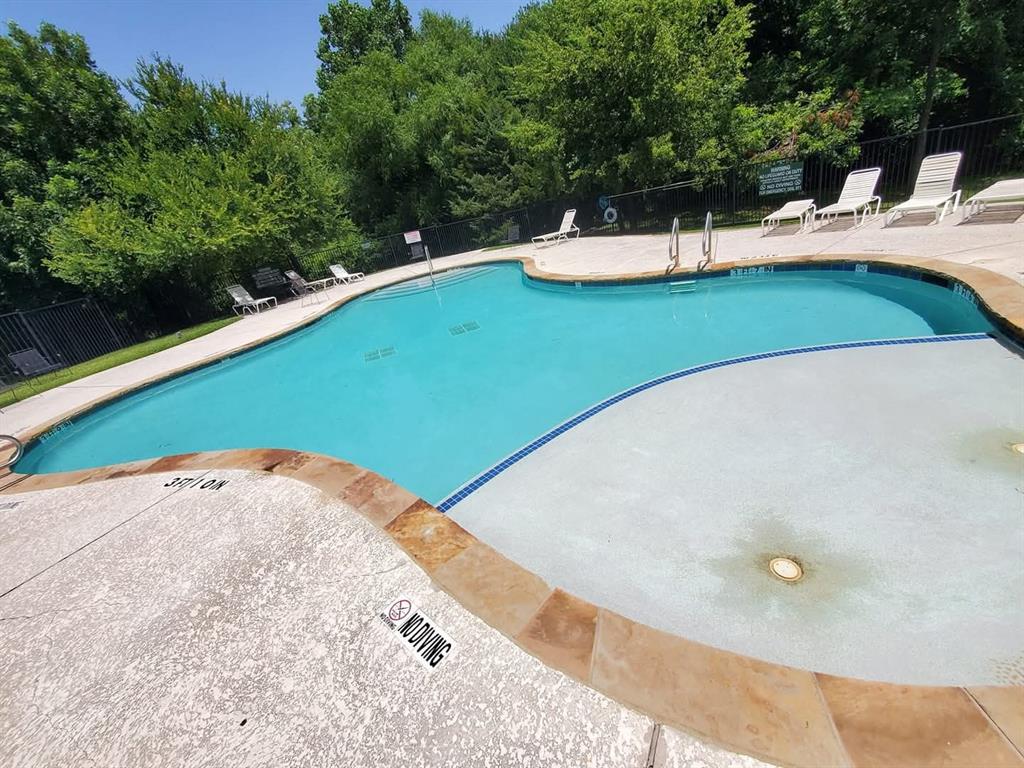 552 Winnetka Drive Oak Point, TX 75068 - Photo 38 of 40 a view of a swimming pool with an outdoor space