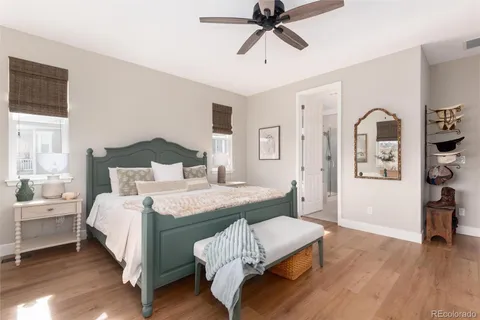 a bed room with a bed and a chandelier