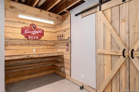 a room with lots of furniture and clutter