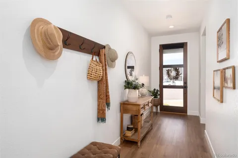 a view of livingroom with furniture and wooden floor